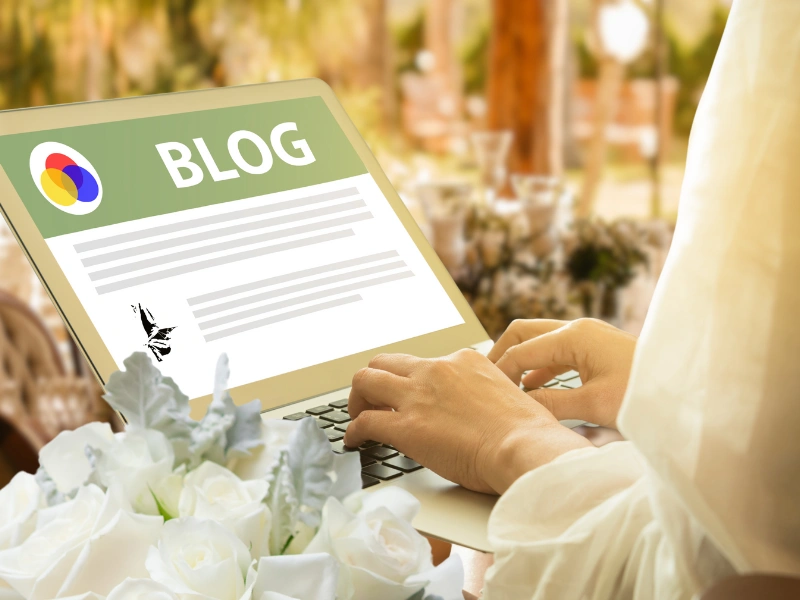 Image of a person writing a wedding venue blog.
